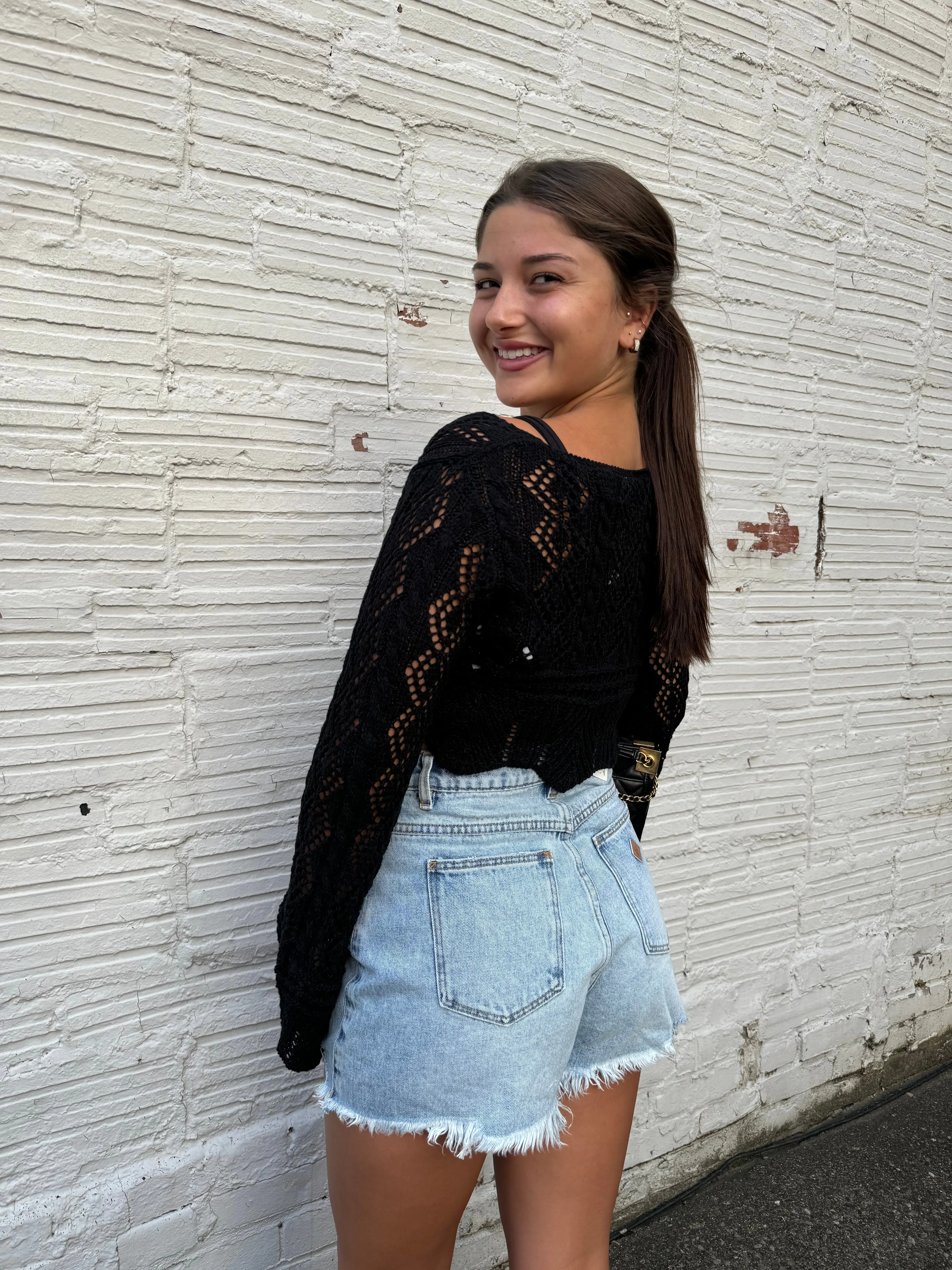 SOARING CROCHET SWEATER IN BLACK