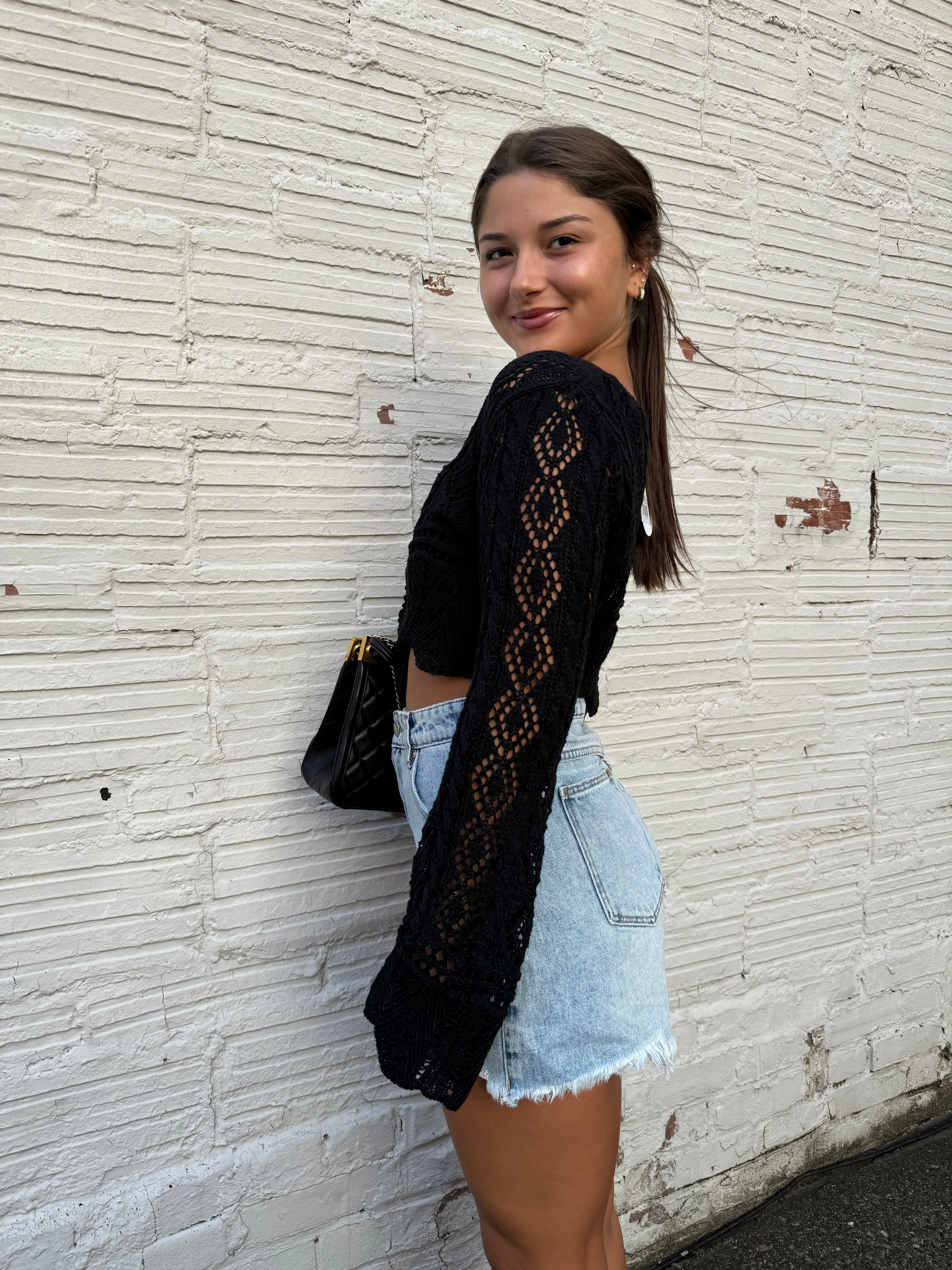 SOARING CROCHET SWEATER IN BLACK